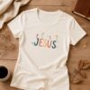 Baby Look Cristã Jesus Off White | KeA Shop Baby Look Cristã Jesus off white 100% algodão da KeA Shop em fotografia flat lay.