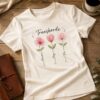 Baby Look Cristã Transborde off white 100% algodão da KeA Shop em fotografia flat lay.
